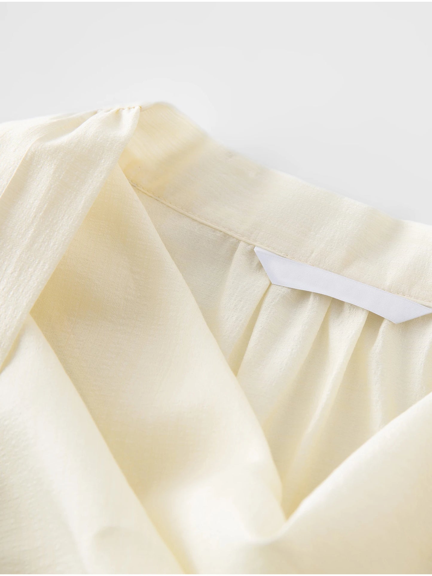 Ivory Draped Tie Neck Blouse