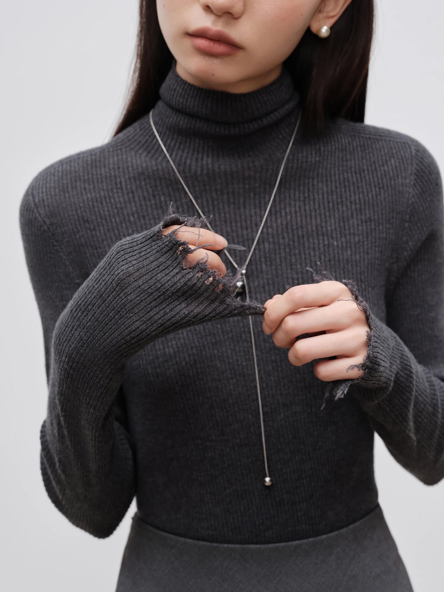 Ribbed Mock Neck Fringe Sweater